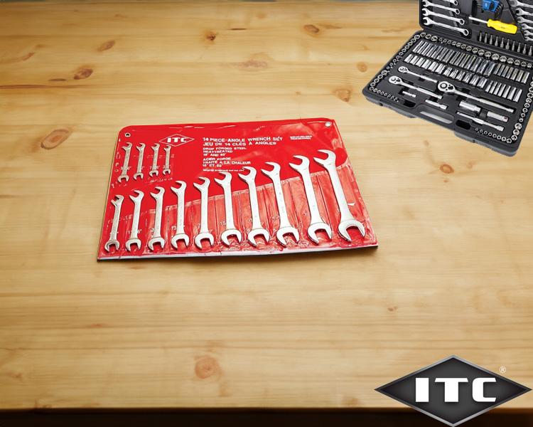 Ensemble de clés à molette ITC organisées sur un support rouge dans un atelier, démontrant la qualité et l'organisation des outils industriels.
